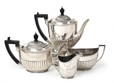 Lot 2064 - A Four-Piece Victorian Silver Tea and Coffee-Service, by Walter and John Barnard, London, 1890...