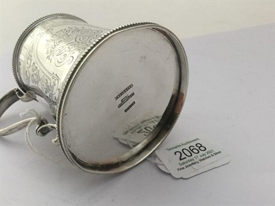 Lot 2068 - A Victorian Scottish Silver Christening-Mug, Edinburgh, 1869, tapering cylindrical and on spreading