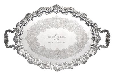 Lot 2083 - An Edward VII Silver Tray, by Barker Brothers, Birmingham, 1904, shaped oval and on four...