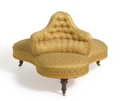 Lot 1703 - A Victorian Walnut Conversation Settee, circa 1860, upholstered in gold floral fabric, the...