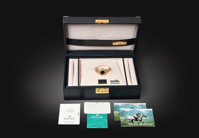 Lot 2141 - A Lady's 18 Carat Gold Diamond Set Automatic Calendar Centre Seconds Wristwatch, signed Rolex,...
