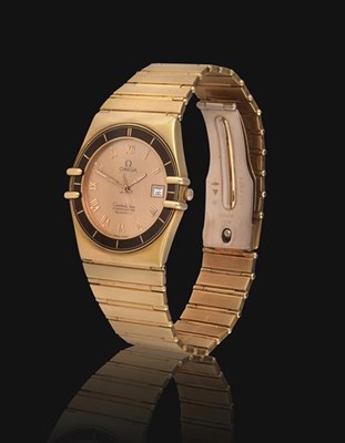 Lot 2146 - An 18 Carat Gold Calendar Centre Seconds Wristwatch, signed Omega, Chronometer, model:...