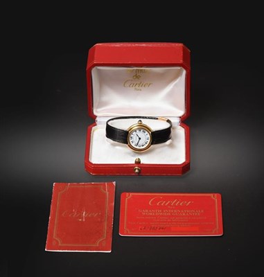 Lot 2149 - A Lady's 18 Carat Gold Wristwatch, signed Cartier, model: Vendome, circa 1979, lever movement...