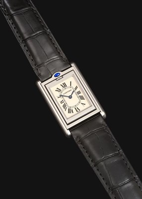 Lot 2150 - A Stainless Steel Reversible Wristwatch, signed Cartier, model: Tank Basculante, ref: 2405,...
