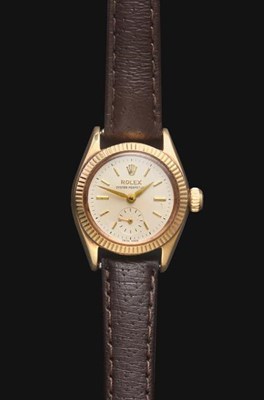 Lot 2151 - A Lady's 9 Carat Gold Automatic Wristwatch, signed Rolex, model: Oyster Perpetual, ref: 6509, 1958