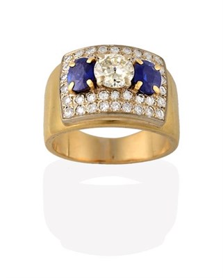 Lot 2190 - A Sapphire and Diamond Ring, a round brilliant cut diamond in white claw settings, flanked by...