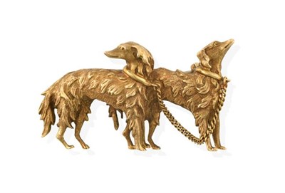 Lot 2192 - A Dog Brooch, realistically modelled as two standing dogs, with yellow textured hair and a...