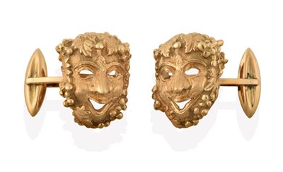 Lot 2195 - A Pair of 18 Carat Gold Cufflinks, realistically modelled as masks, with swivel bars, measure 2.3cm