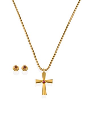 Lot 2197 - A Ruby Cross Pendant on Chain, by Ilias Lalaounis, the cross inset with a round cabochon ruby...