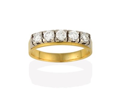 Lot 2203 - A Diamond Five Stone Ring, the round brilliant cut diamonds in white claw settings, to a yellow...