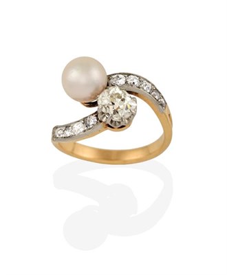 Lot 2206 - A Diamond and Cultured Pearl Twist Ring, the old cut diamond diagonally set to a cultured...