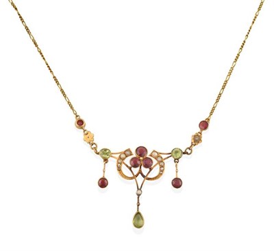 Lot 2207 - An Edwardian Peridot, Garnet and Split Pearl Necklace, the scroll motif set throughout with...