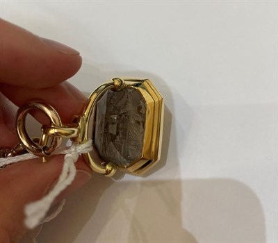 Lot 2217 - A Figaro Albert Chain and Seal Fob, the plain polished Albert suspending a smoky quartz...