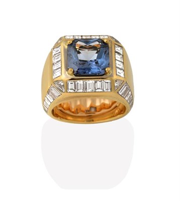 Lot 2233 - A Contemporary Blue Spinel and Diamond Ring, the square mixed cut blue spinel in a yellow claw...