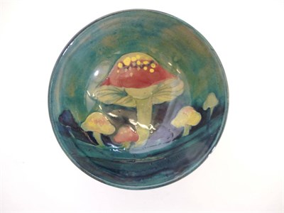 Lot 1721 - A William Moorcroft Claremont Toadstool Pattern Bowl, circa 1918, on a blue/green ground, impressed