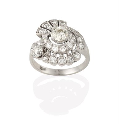 Lot 2245 - A Diamond Cluster Ring, realistically modelled as a shell motif, set throughout with round...