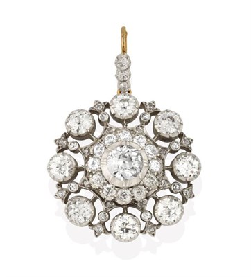 Lot 2257 - A Diamond Brooch/Pendant, an old cut diamond centrally within a border of smaller old cut diamonds