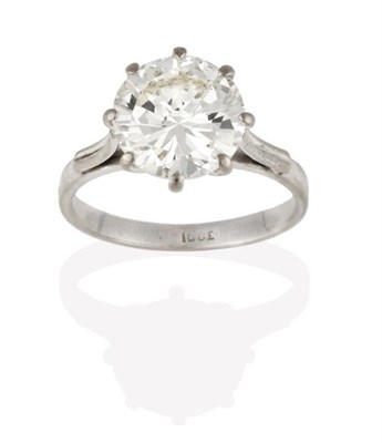 Lot 2274 - A Diamond Solitaire Ring, the round brilliant cut diamond in a white claw setting, to a tapered...