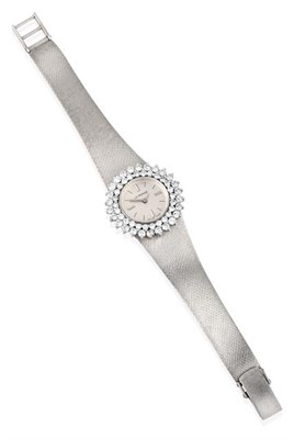 Lot 2276 - A Lady's 18 Carat White Gold Diamond Set Wristwatch, signed Le Monde, circa 1975, lever...
