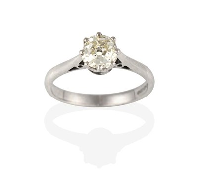 Lot 2279 - An 18 Carat White Gold Diamond Solitaire Ring, the old cut diamond in a claw setting, to a...
