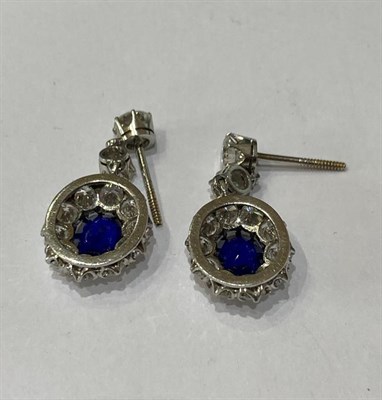 Lot 2281 - A Pair of Sapphire and Diamond Drop Earrings, two graduated round brilliant cut diamonds...