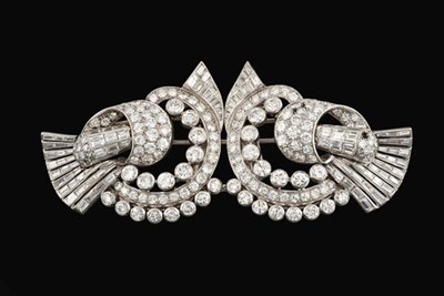Lot 2292 - An Art Deco Diamond Double Clip Brooch, the openwork scroll design set throughout with round...
