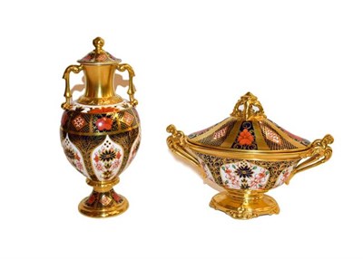 Lot 12 - Royal Crown Derby Imari: A twin-handled vase and cover, 20cm high, together with an oval...