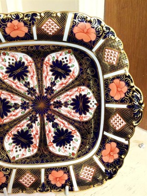 Lot 20 - Royal Crown Derby Imari: A pair of cake plates and a small vase (3)