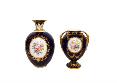 Lot 22 - Royal Crown Derby: A gilt and cobalt blue twin-handled vase painted with floral sprays and...