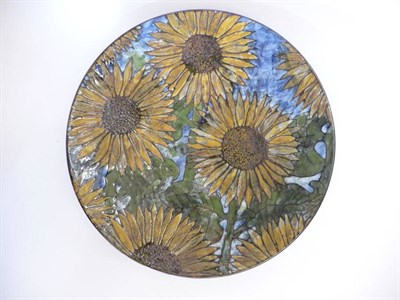 Lot 1746 - A Dartington Pottery Sunflowers Stoneware Charger, impressed factory mark and Sunflowers...