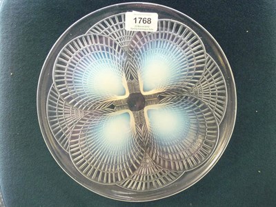 Lot 1768 - A Rene Lalique "Coquilles" Opalescent and Clear Glass Dish, the underside moulded in relief...