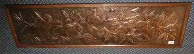 Lot 1776 - An Art & Crafts Copper Panel, embossed with cherubs, fruit and bees, unmarked, 29cm by 116.5cm