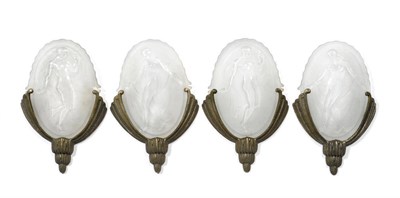 Lot 1789 - A Set of Four Clear and Frosted Glass and Gilt-Metalwork Wall Appliques, circa 1930, the glass...