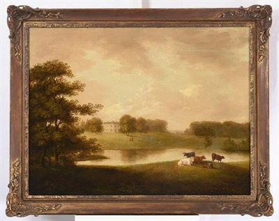 Lot 1051 - British School (18th/19th century) A country house in idyllic parkland with cattle grazing Oil...