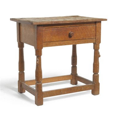 Lot 1798 - A 1930's Robert "Mouseman" Thompson Oak Side Table, the overhanging rectangular top with carved...