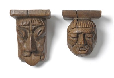 Lot 1801 - Two Robert "Mouseman" Thompson Carved Oak Head Corbels, both as monk's, one with tongue protruding