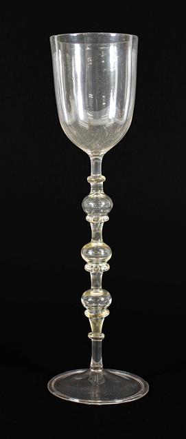 Lot 2 - A Façon de Venise Glass Wine Glass, probably Low Counties, 17th century, the rounded funnel...