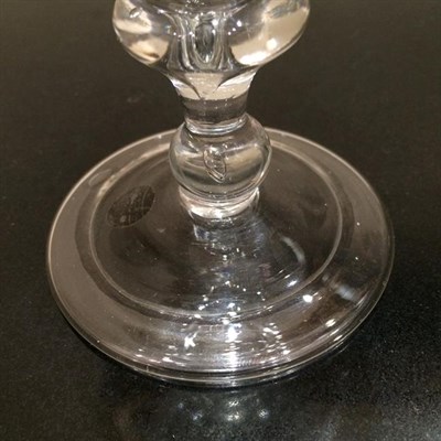 Lot 5 - A Large Wine Glass, circa 1710, the ogee bowl on triple collar stem with cushion knop and ball knop