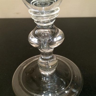 Lot 5 - A Large Wine Glass, circa 1710, the ogee bowl on triple collar stem with cushion knop and ball knop