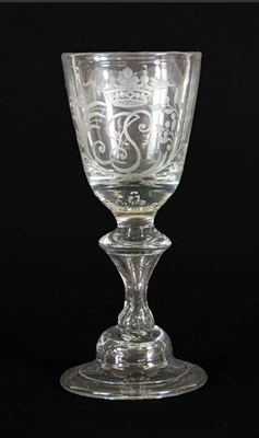 Lot 8 - A Wine Glass, circa 1730, the rounded funnel bowl engraved with a crowned GS monogram within a...