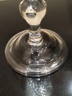 Lot 9 - A Glass Goblet, circa 1730, the rounded funnel bowl moulded with ''Nipt diamond waies'' on a triple