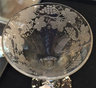 Lot 13 - A Wine Glass, 1740, the drawn trumpet bowl engraved with fruiting vine on a baluster stem,...