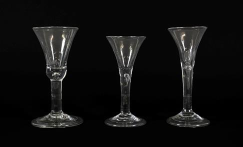 Lot 15 - A Wine Glass, circa 1740, the bell shaped bowl with basal air tear on a plain stem and folded foot