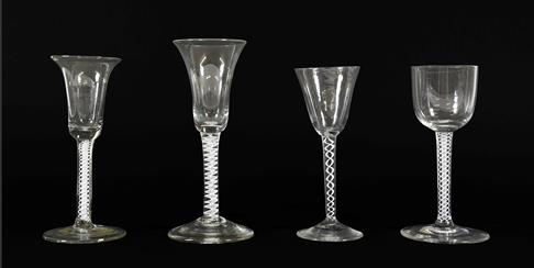 Lot 18 - A Wine Glass, circa 1750, the bell shaped bowl on an opaque twist stem, 17.5cm high; A Similar Wine