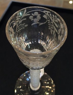 Lot 22 - A Cordial Glass, circa 1760, the semi-fluted rounded funnel bowl engraved with a band of foliage on