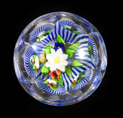 Lot 27 - A Baccaret Faceted Glass Upright Bouquet Paperweight, circa 1850, the three dimensional posy over a