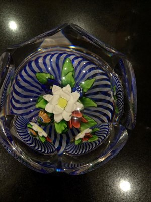 Lot 27 - A Baccaret Faceted Glass Upright Bouquet Paperweight, circa 1850, the three dimensional posy over a