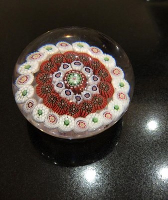 Lot 28 - A Baccaret Miniature Pansy Paperweight, circa 1850, with purple and ochre petals and star cut base