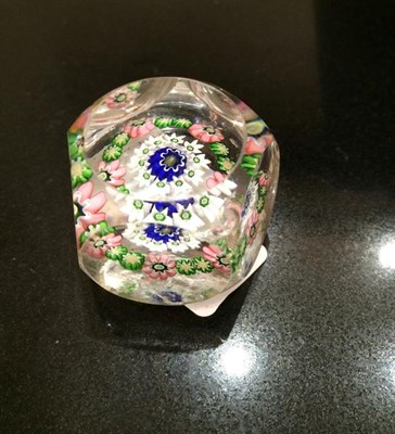 Lot 30 - A Clichy Miniature Spaced Millefiori Glass Paperweight, circa 1850, centred by a Clichy rose within