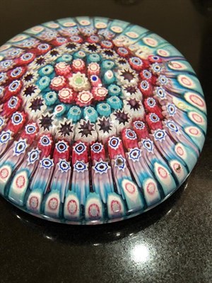 Lot 30 - A Clichy Miniature Spaced Millefiori Glass Paperweight, circa 1850, centred by a Clichy rose within